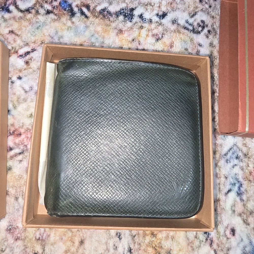 Full Inclusion Louis Vuitton Green Tiaga Zip Around Organizer. COA Included